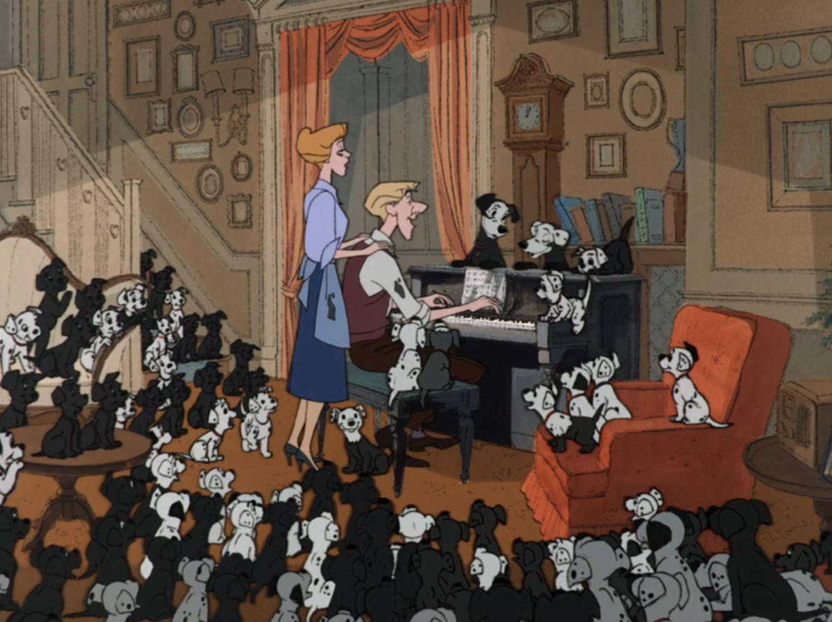 Anita and Roger Darling sing at the piano, surrounded by 101 sooty dalmatians in One Hundred and One Dalmatians. 