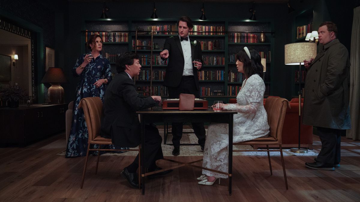 Elizabeth Perkins, Ken Jeong, Zach Woods, Poppy Liu and Paul Walter Hauser sit and stand around a drawing room table in The Afterparty.