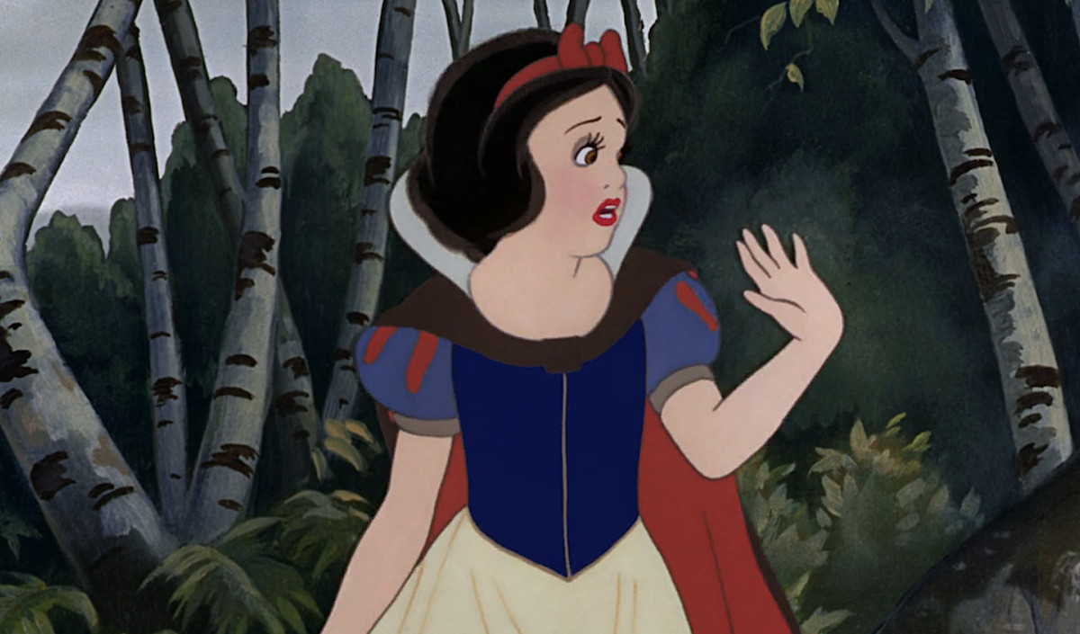 Snow White in Snow White and the Seven Dwarfs looks horrified as she retreats from the huntsman who nearly stabbed her and cut out her heart, which is a pretty normal way to respond to someone who does that