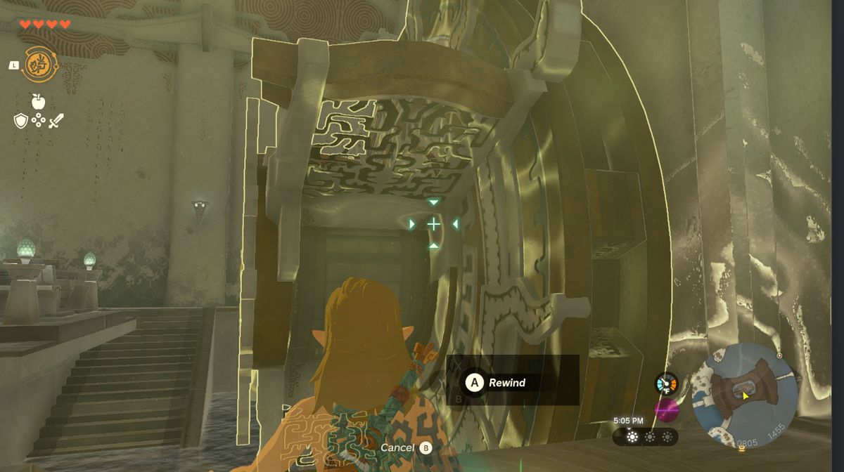 Link tittar på ett vattenhjul på Great Sky Island i Zelda Tears of the Kingdom.