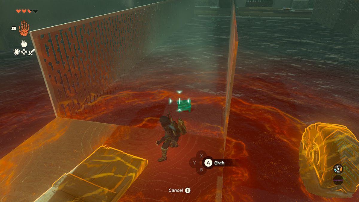 Link använder Ultrahand för att fästa en klot till en vagn i Tukarok Shrine i Zelda Tears of the Kingdom.