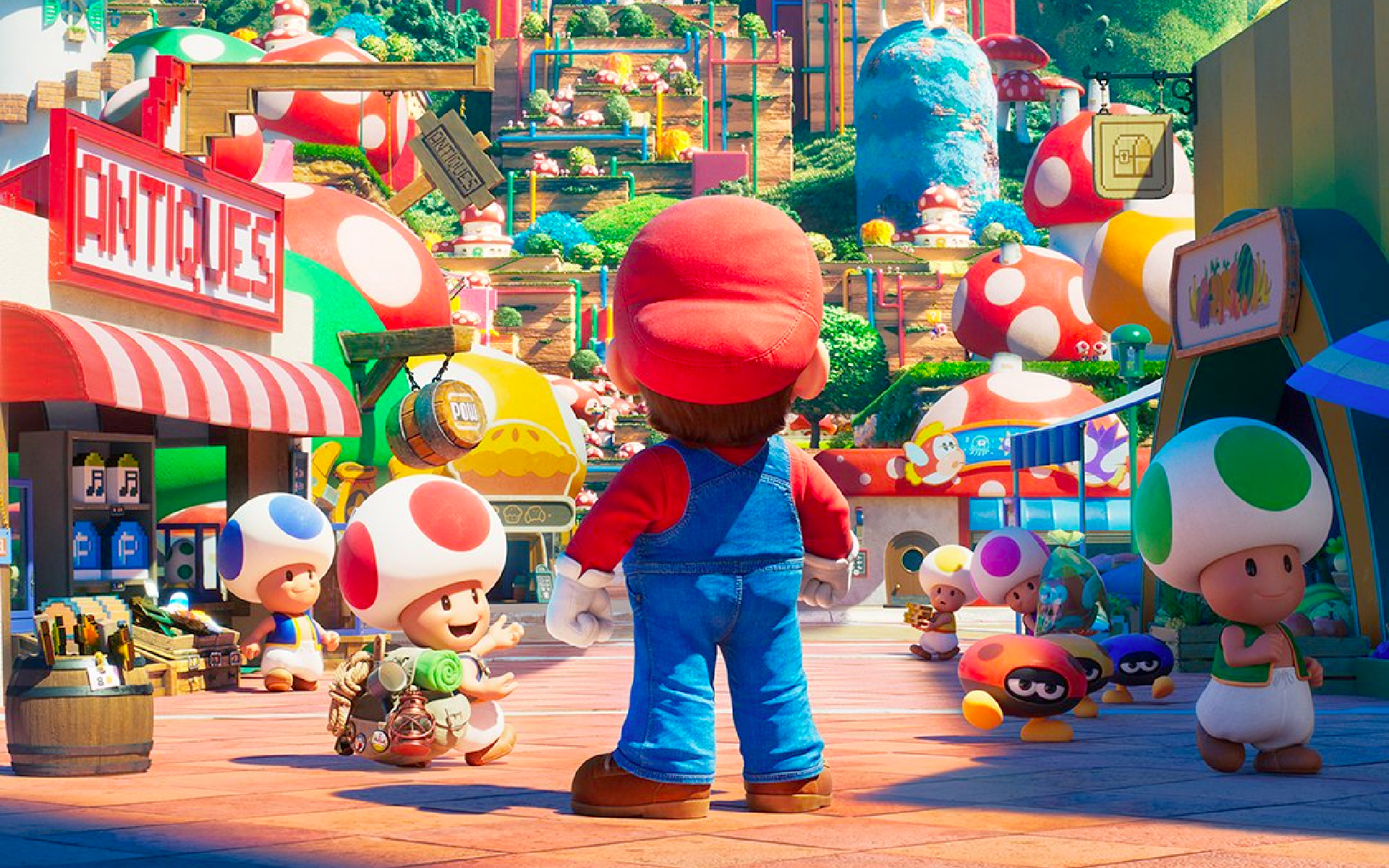 Baksidan av Mario när han står på en fullsatt shoppinggata befolkad av Paddor i Svampriket