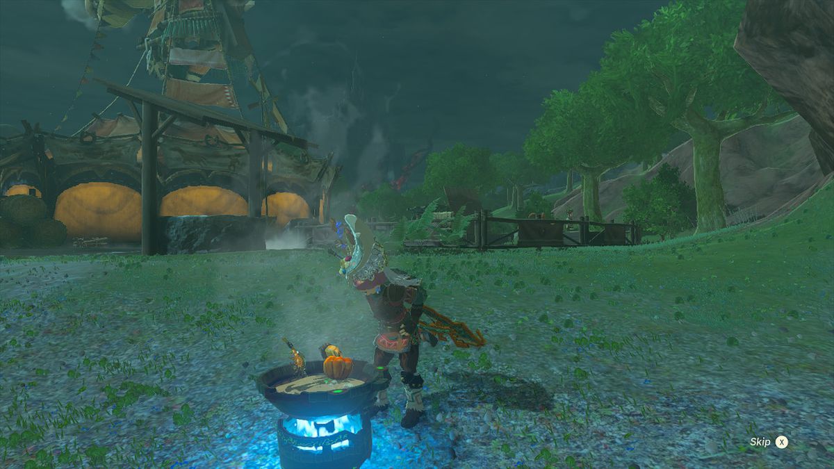 Link, klädd i en snygg outfit, står över en bärbar kokkärl.  Ett stall finns i bakgrunden.