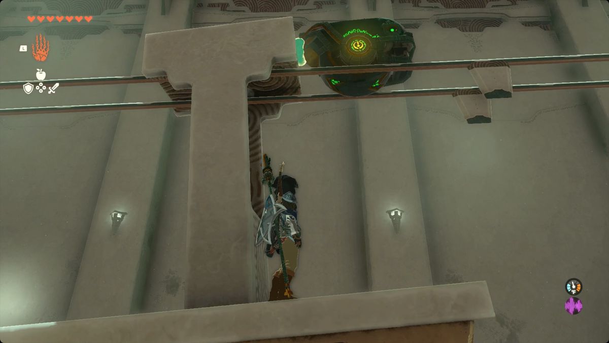The Legend of Zelda: Tears of the Kingdom - Link som åker en vagn över en räl med en motor som drar honom.