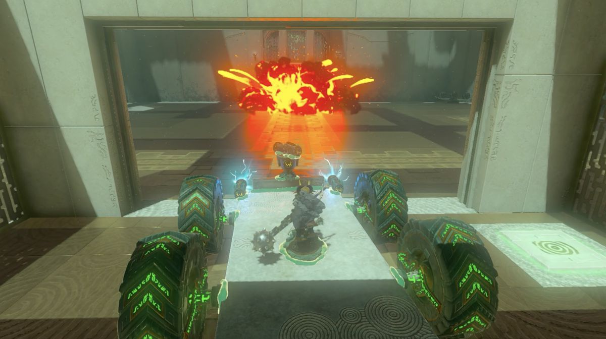 Link kör en krigsmaskin med stor hjul i Rasitakiwak Shrine i Zelda: Tears of the Kingdom