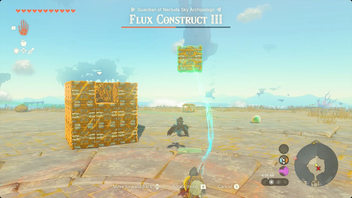 The Legend of Zelda: Tears of the Kingdom Länka med Ultrahand för att ta bort block från en Flux Construct 3 medan den är i kubform.
