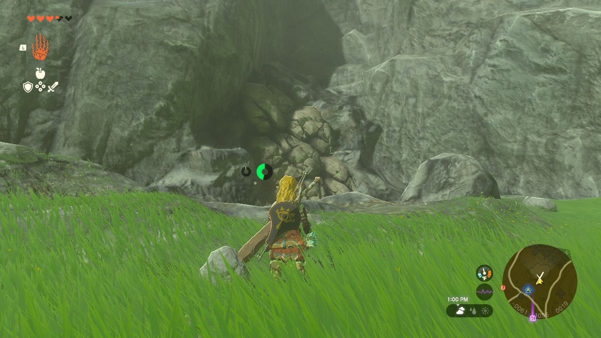 Link stirrar på en grotta blockerad av spillror i Zelda Tears of the Kingdom.