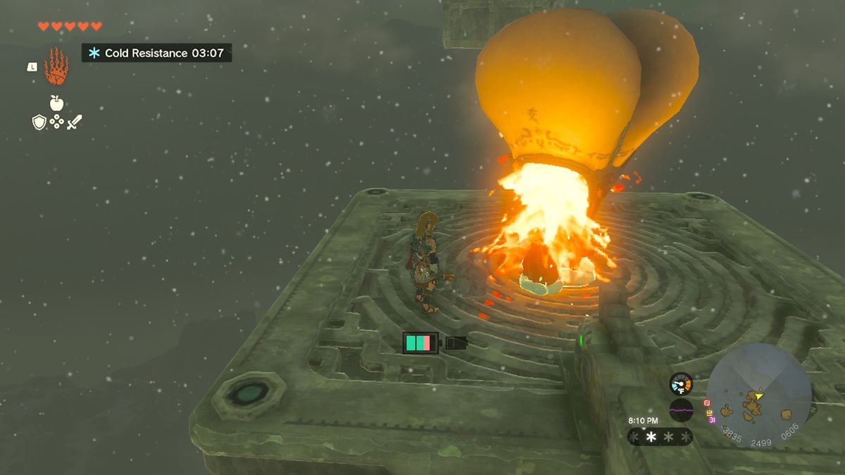 Link crashes a balloon on a floating platform in Zelda Tears of the Kingdom.