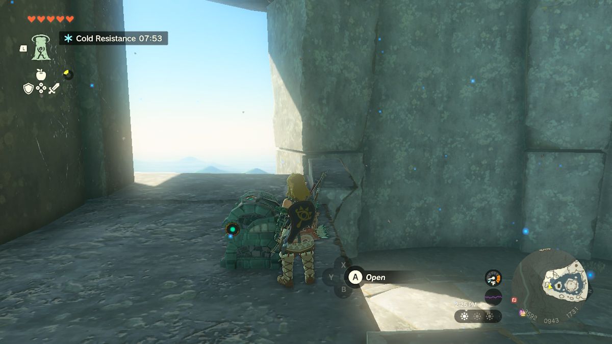 Link stands next to a chest containing the Zonaite Armor on Lightcast Island in Zelda Tears of the Kingdom.