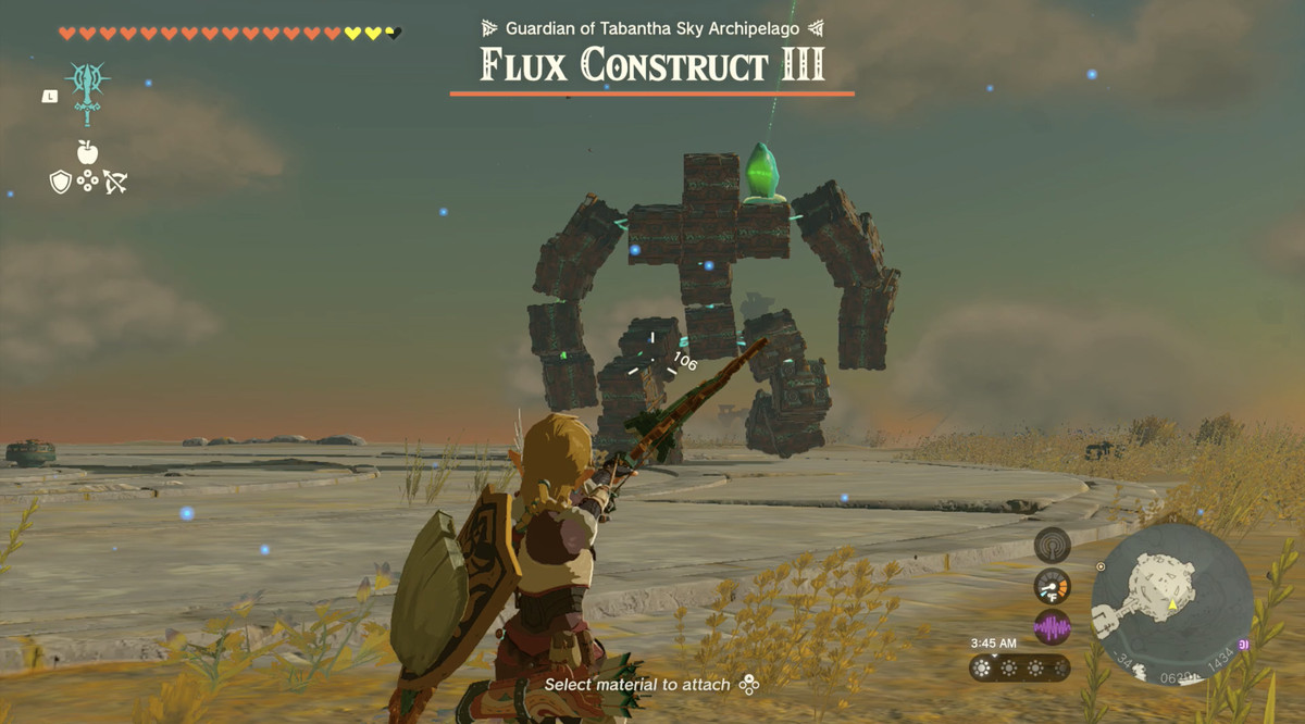 Link riktar en pil mot ett Flux Contruct i The Legend of Zelda: Tears of the Kingdom.  Chefen ser ut som ett gäng kuber som formas till en mänsklig figur.