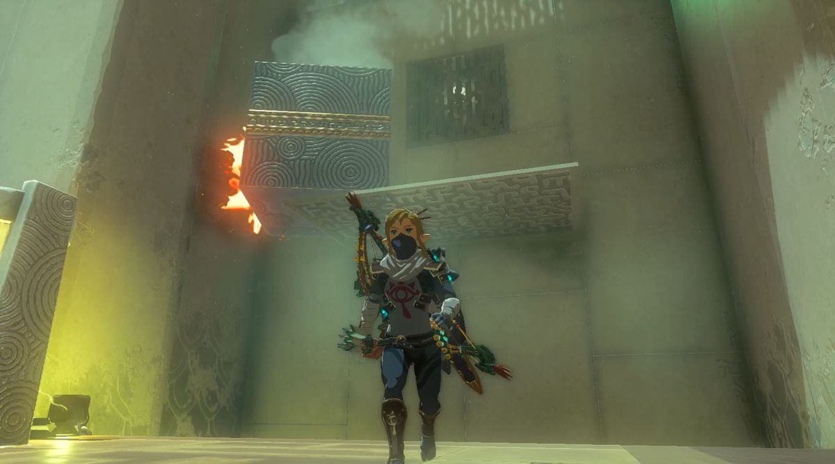 Link blockerar eld med sten i Tadarok Shrine Fire and Water-utmaningen i Zelda: Tears of the Kingdom
