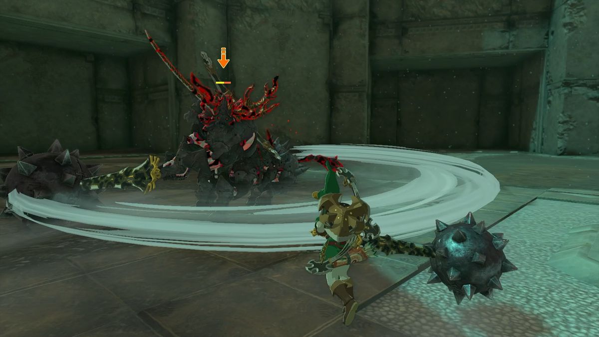 Link facing off against the fifth Lynel, an armored Silver Lynel, during the boss rush at the Floating Coliseum, which is located in the Depths in The Legend of Zelda: Tears of the Kingdom.