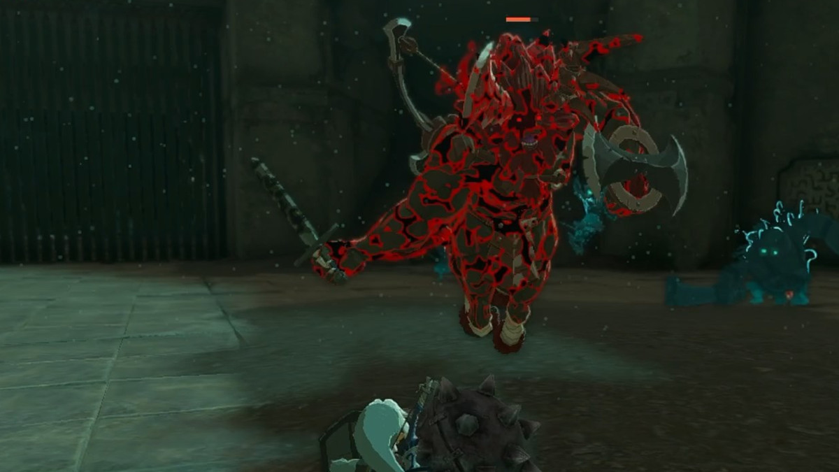 Link facing off against the first Lynel, a Red Lynel, during the boss rush at the Floating Coliseum, which is located in the Depths in The Legend of Zelda: Tears of the Kingdom.
