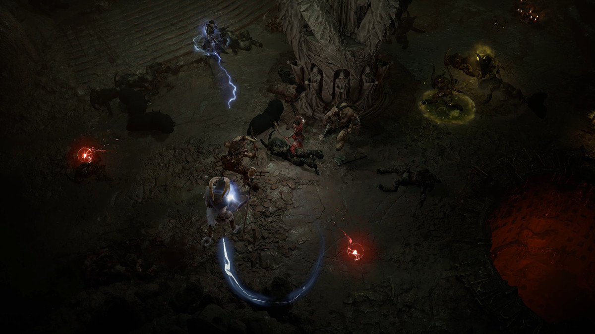 A character uses a whip-like lightning attack in a dimly lit room in Diablo 4