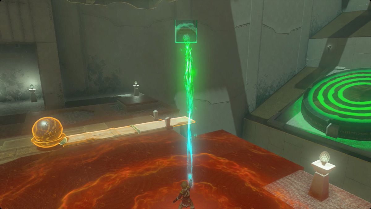 The Legend of Zelda: Tears of the Kingdom Link förbereder sig för att lansera en boll från en utökad katapult i Wao-os Shrine