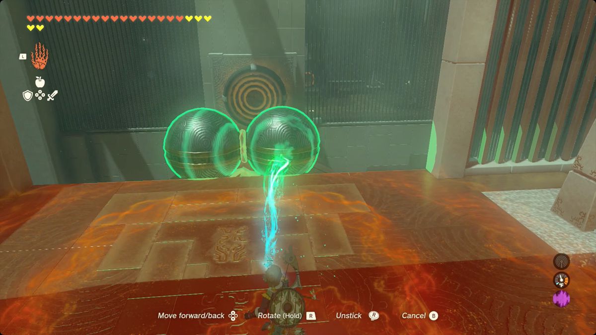 The Legend of Zelda: Tears of the Kingdom Länka med hjälp av Ultrahand för att rulla ett par bollar i en hantelform nerför en ramp i Iun-orok Shrine.