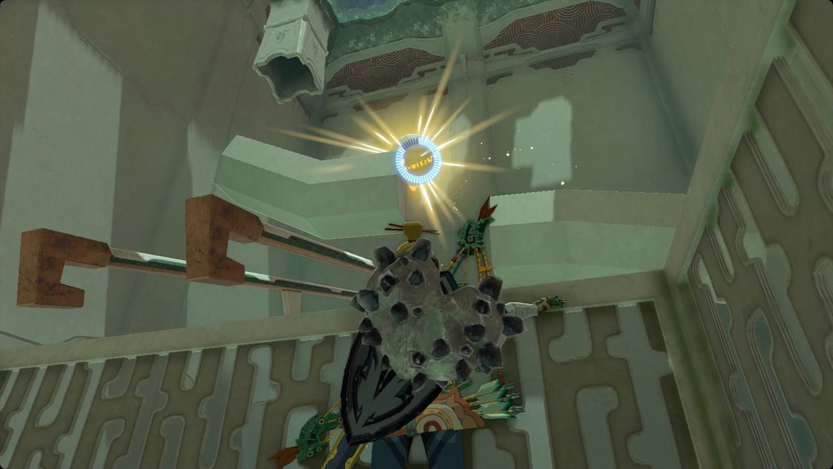 The Legend of Zelda: Tears of the Kingdom Link använder Recall för att stoppa en rullande boll i Mayamats Shrine