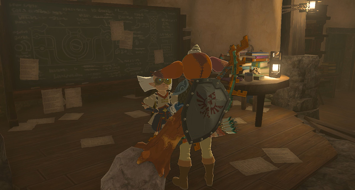 Robbie pratar med Link i sitt labb i Zelda: Tears of the Kingdom