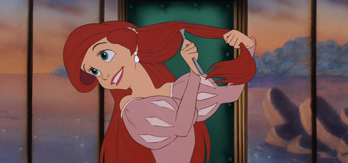 Human-Ariel in The Little Mermaid enthusiastically combs her hair with a fork while sitting at a table with Prince Eric