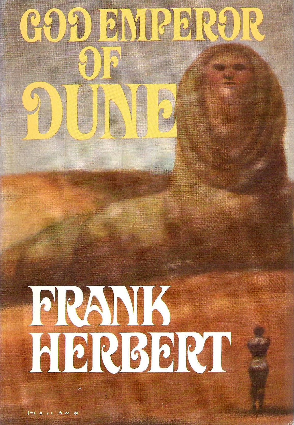 Ett omslag till boken God Emperor of Dune, med en gigantisk sandmask med ett mänskligt ansikte sittande i öknen, en liten människofigur i siluett framför den, stående och vänd mot den