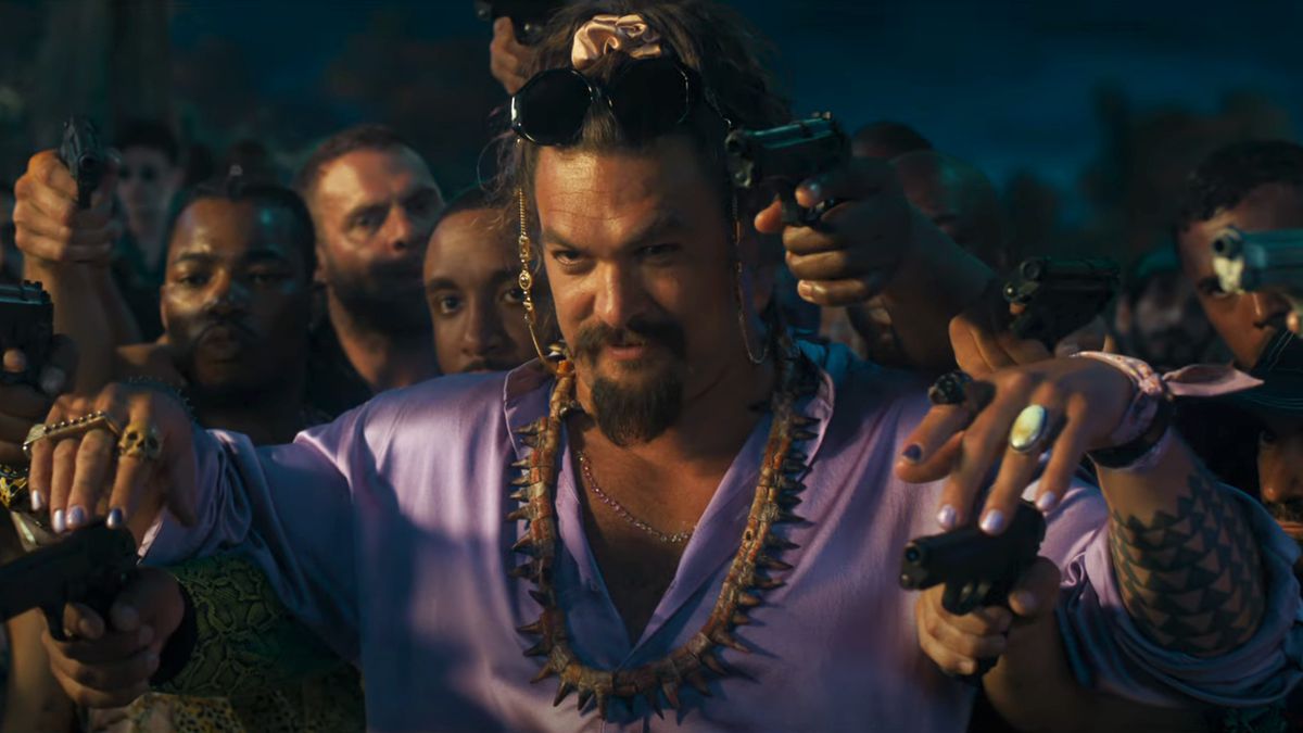 Jason Momoa is flanked by a billion guns while posing with his painted fingernails in the Fast X trailer.