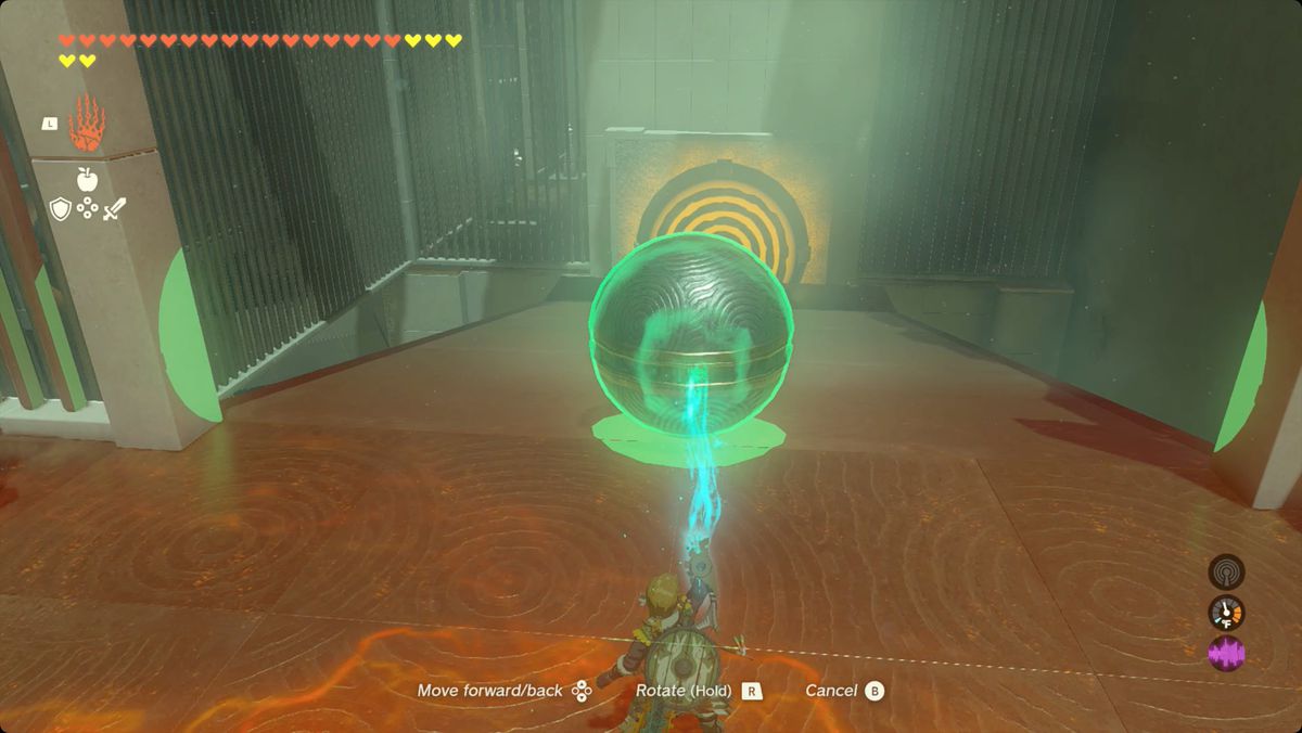 The Legend of Zelda: Tears of the Kingdom Link använder Ultrahand för att rulla en boll nerför en ramp i Iun-orok Shrine