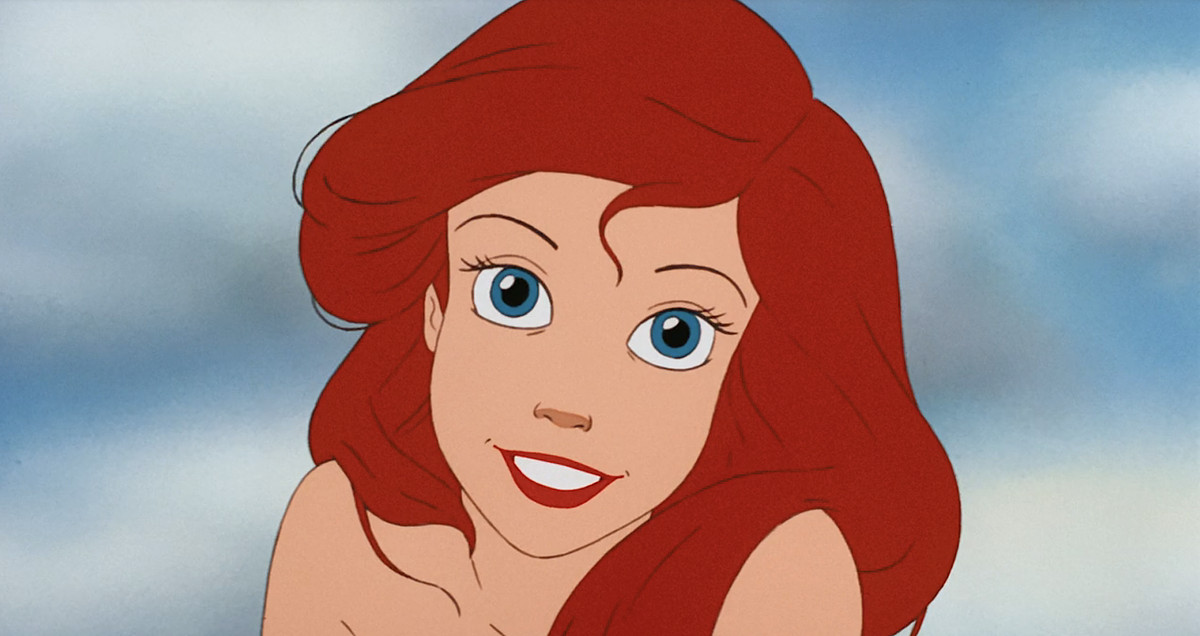 Ariel ler direkt in i kameran i en närbild från den animerade Lilla sjöjungfrun från 1989