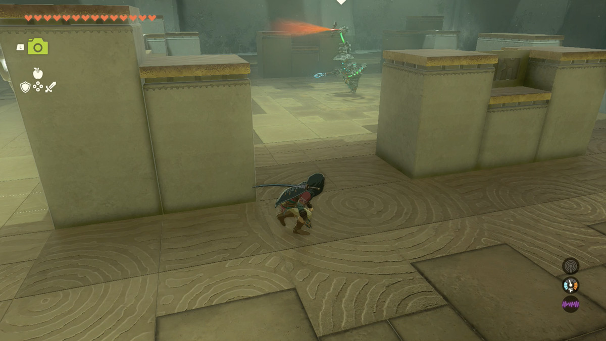 Länk som smyger runt en fiende i The Legend of Zelda: Tears of the Kingdom. 