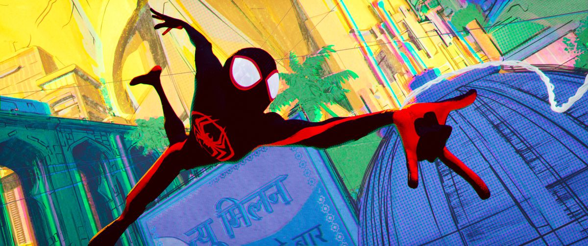 Miles Morales in his dark-blue-and-blood-red Spider-Man outfit flails in mid-air at the end of a web, while a bright, bold, almost abstract cityscape stretches out behind him in Spider-Man: Across the Spider-Verse
