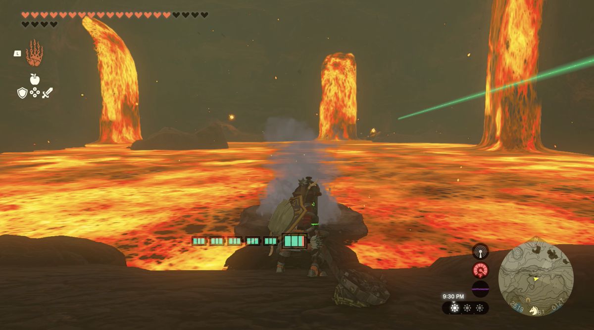 Link gör en sten av lava med hjälp av en brandpost i Lake Intenoch Cave mot Moshapin Shrine i Zelda: Tears of the Kingdom