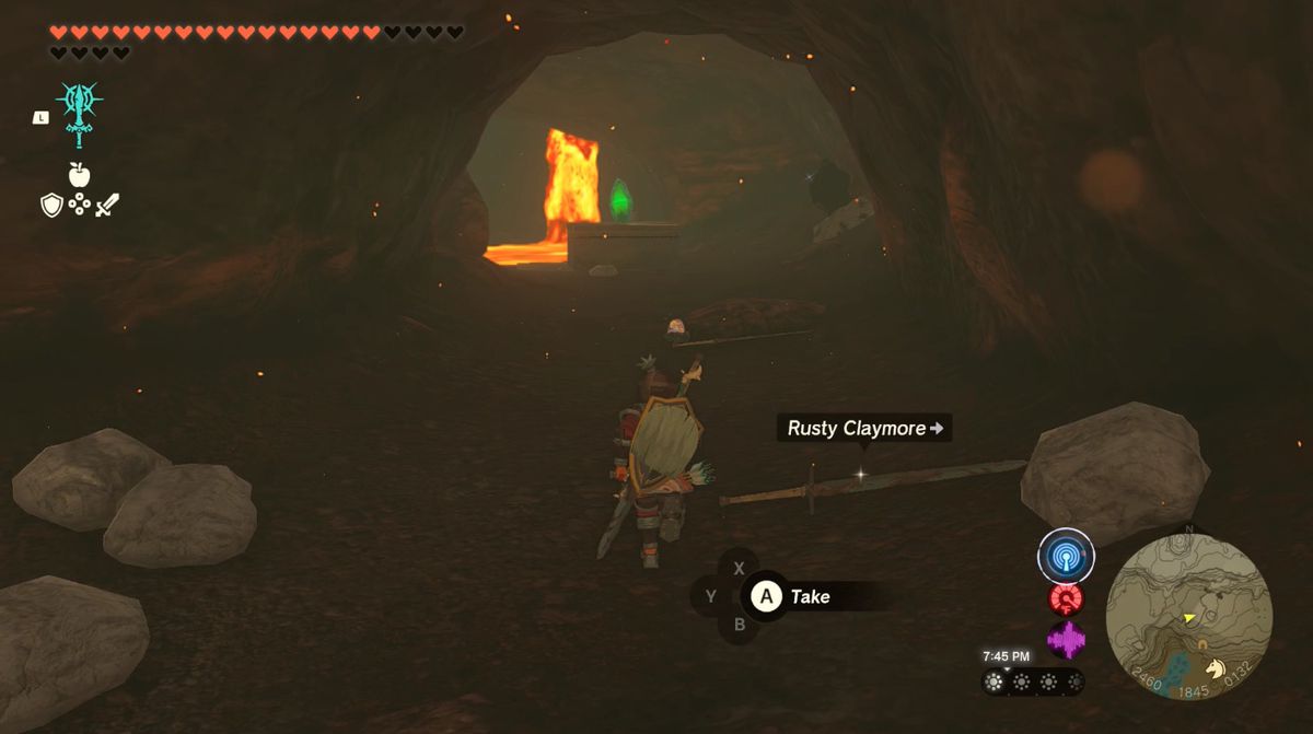 Link går mot en grön helgedomskristall och en lavasjö i Lake Intenoch Cave mot Moshapin Shrine i Zelda: Tears of the Kingdom