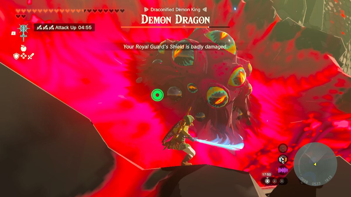 Link attacks a globule of eyeballs on the back of the demon dragon final boss fight in Zelda Tears of the Kingdom.