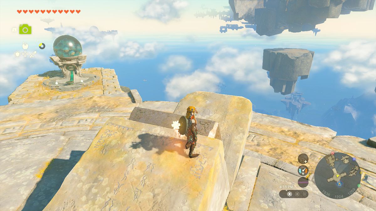 Link stands next to a mechanism at the center of the island, preparing himself to be pushed off of it in Zelda: Tears of the Kingdom