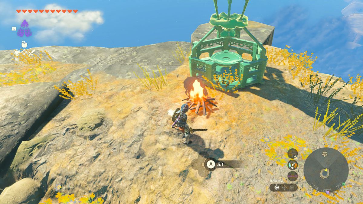 Link stands next to a campfire in Zelda: Tears of the Kingdom