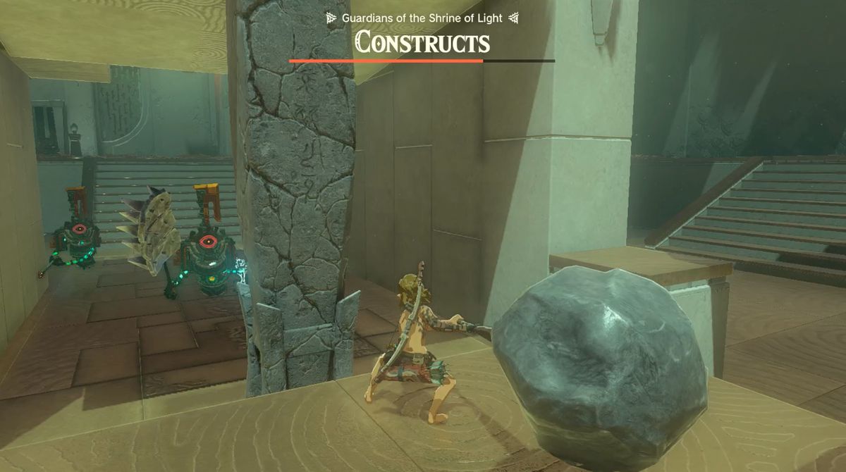 Link krossar en stenpelare med en stenhammare i Otak Shrine 'Proving Grounds: Traps'-uppdraget i Zelda: Tears of the Kingdom