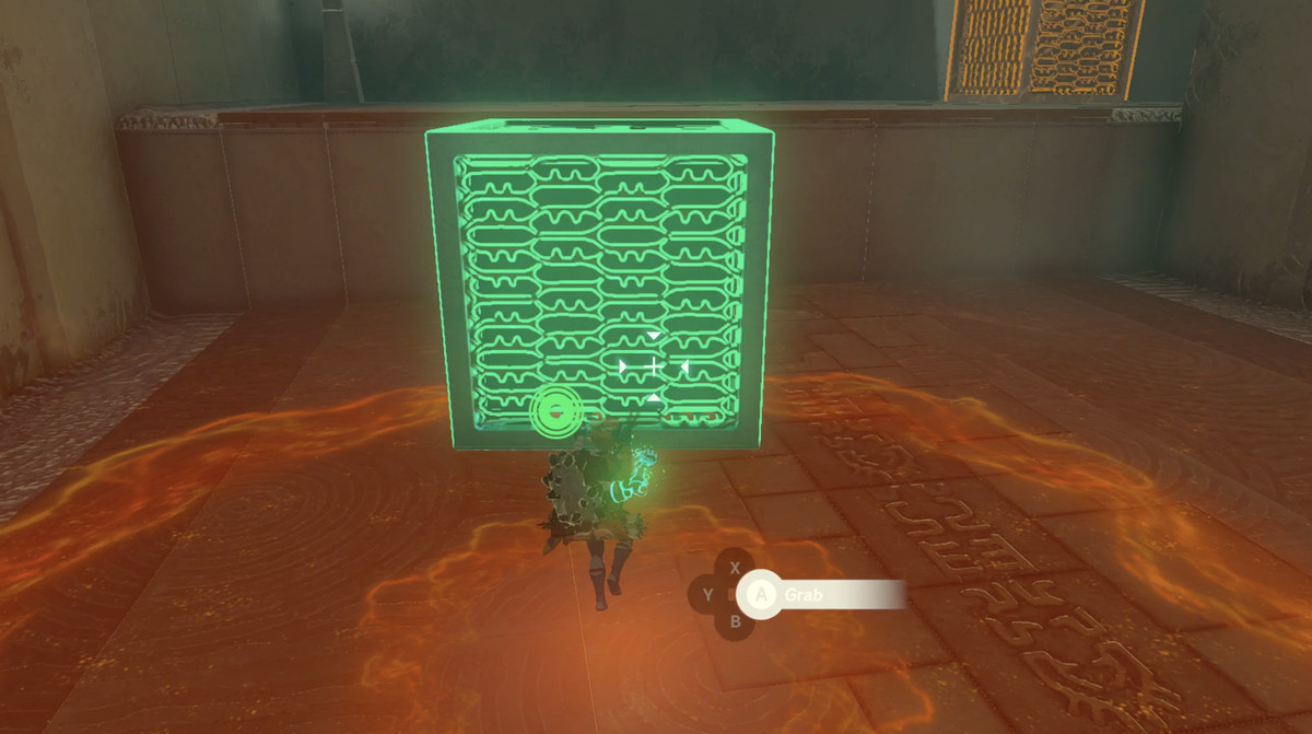 En bild av Link som använder Ultrahand för att flytta en kub i The Legend of Zelda: Tears of the Kingdom.