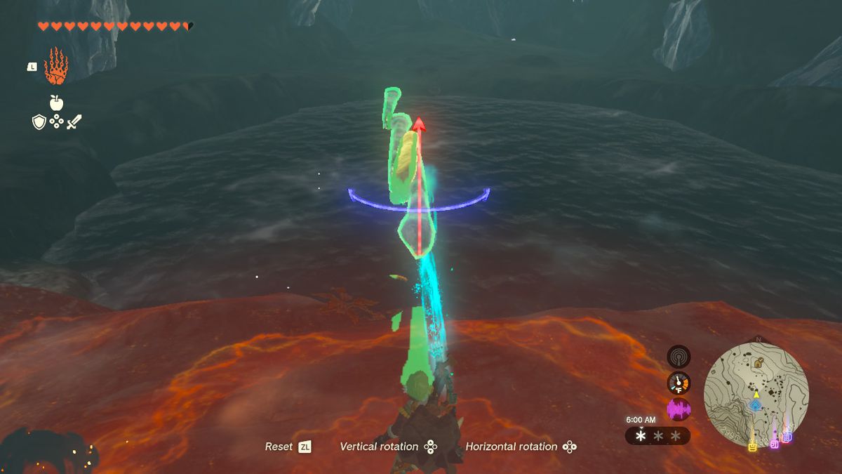 Link håller tre långa istappar fästa tillsammans med Ultrahand över en damm.