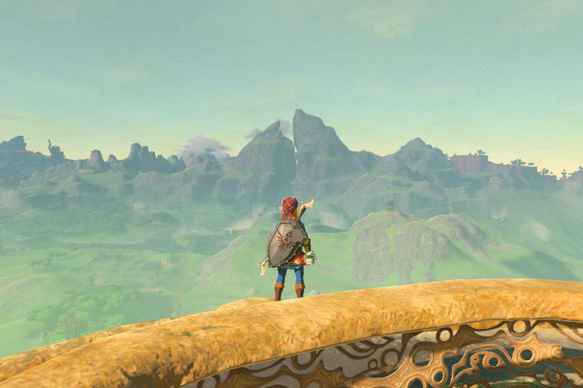 Link ser ut över Hyrule och Dueling Peaks i The Legend of Zelda: Breath of the Wild