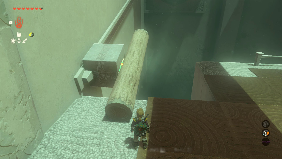 Link har använt Ultrahand för att limma fast en stock på en sten på väggen som finns på en reglage som en del av ett pussel i Oshozan-u Shrine