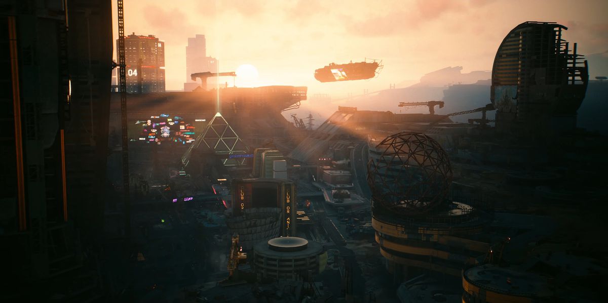 Solen går ner över Dogtown-remsan som domineras av en neongrön pyramid i en skärmdump från Cyberpunk 2077: Phantom Liberty.