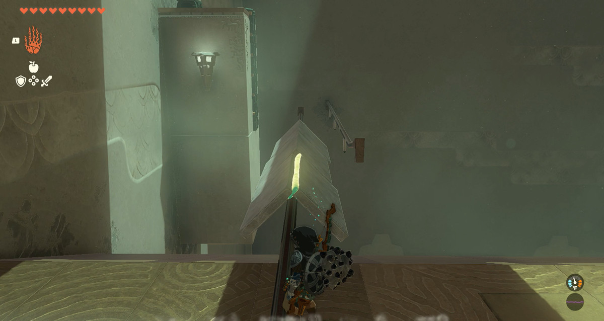 Skärmdump av Runakit-helgedomen, som visar karetformade paneler på en skena i en Legend of Zelda: Tears of the Kingdom-helgedom