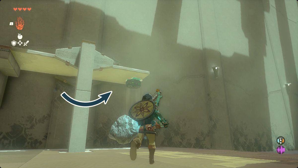 The Legend of Zelda: Tears of the Kingdom - Länk med hjälp av en Zonai-fläkt för att lyfta en gungbräda i Ishodag Shrine