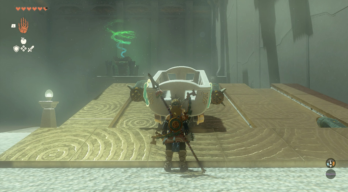 En bild av Link in the Oromuwak Shinre i The Legend of Zelda: Tears of the Kingdom.  Han har byggt en minkärra med två raketer fästa vid sidorna av den. 