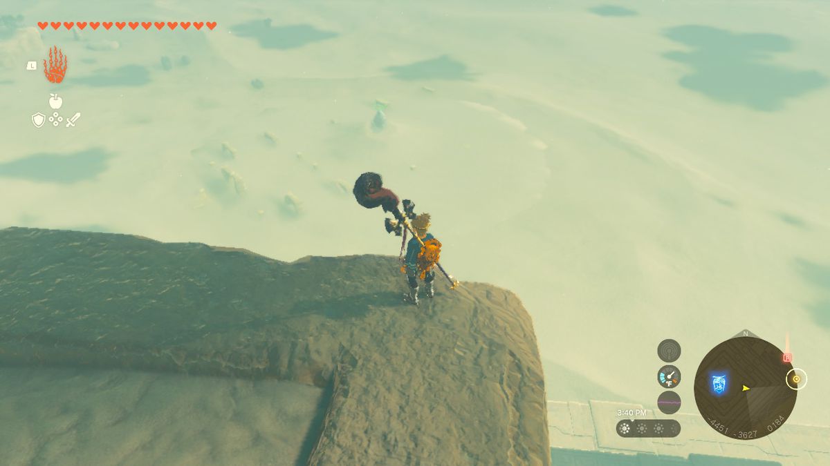 Länk som står på toppen av Lightning Temple i Zelda: TOTK, tittar ner på en helgedom