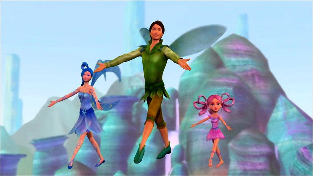 A male fairy in green dancing in the air, with a blue female fairy and a small pink female fairy behind him.