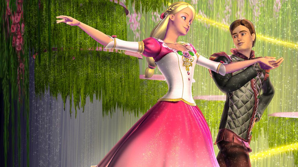 Barbie as Princess Genevieve, wearing a pink dress, as Derek the shoe cobbler, a brunette young man, dances with her. Behind them is a sprinkling of golden lights.