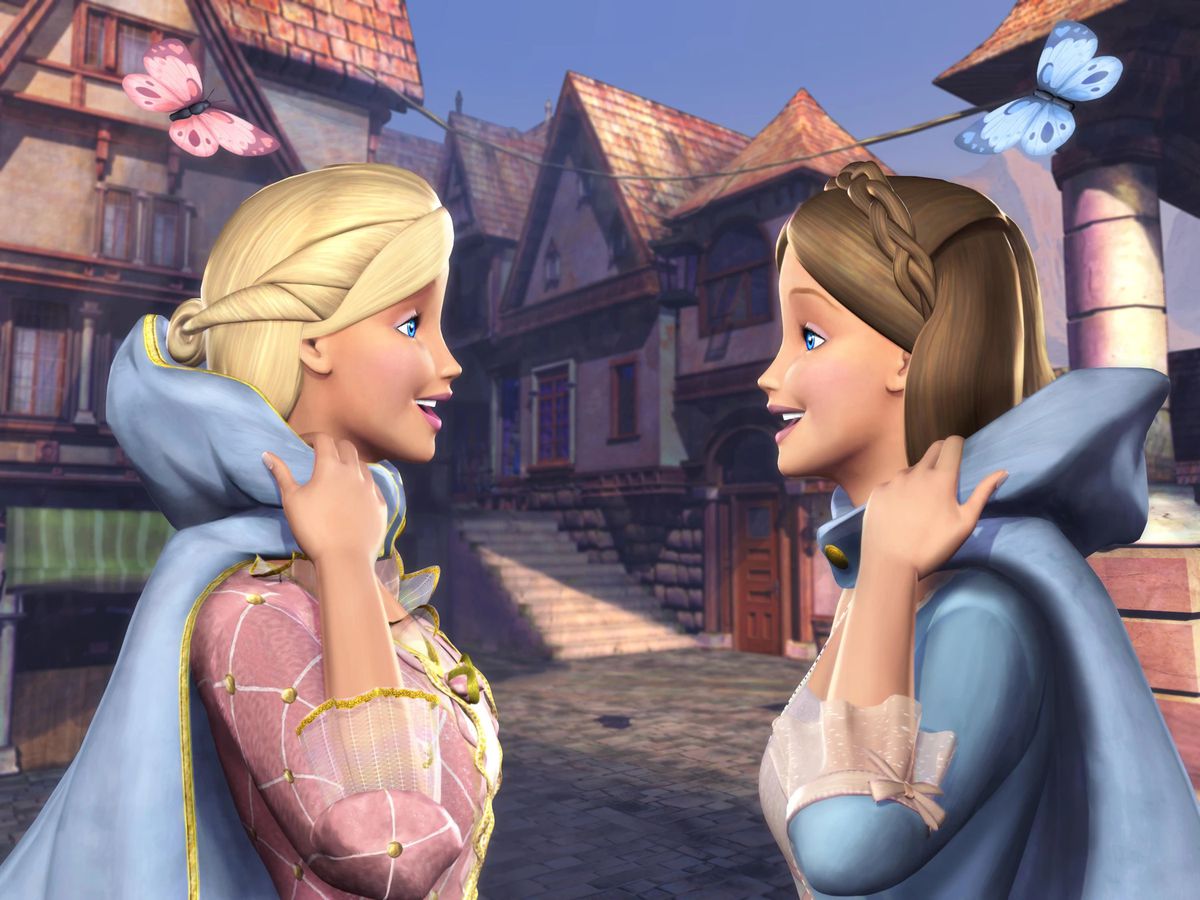 A blonde girl in an oldtimey pink dress gasps as she looks at a brunette girl in an oldtimey blue dress. Behind them is a fairy tale village.