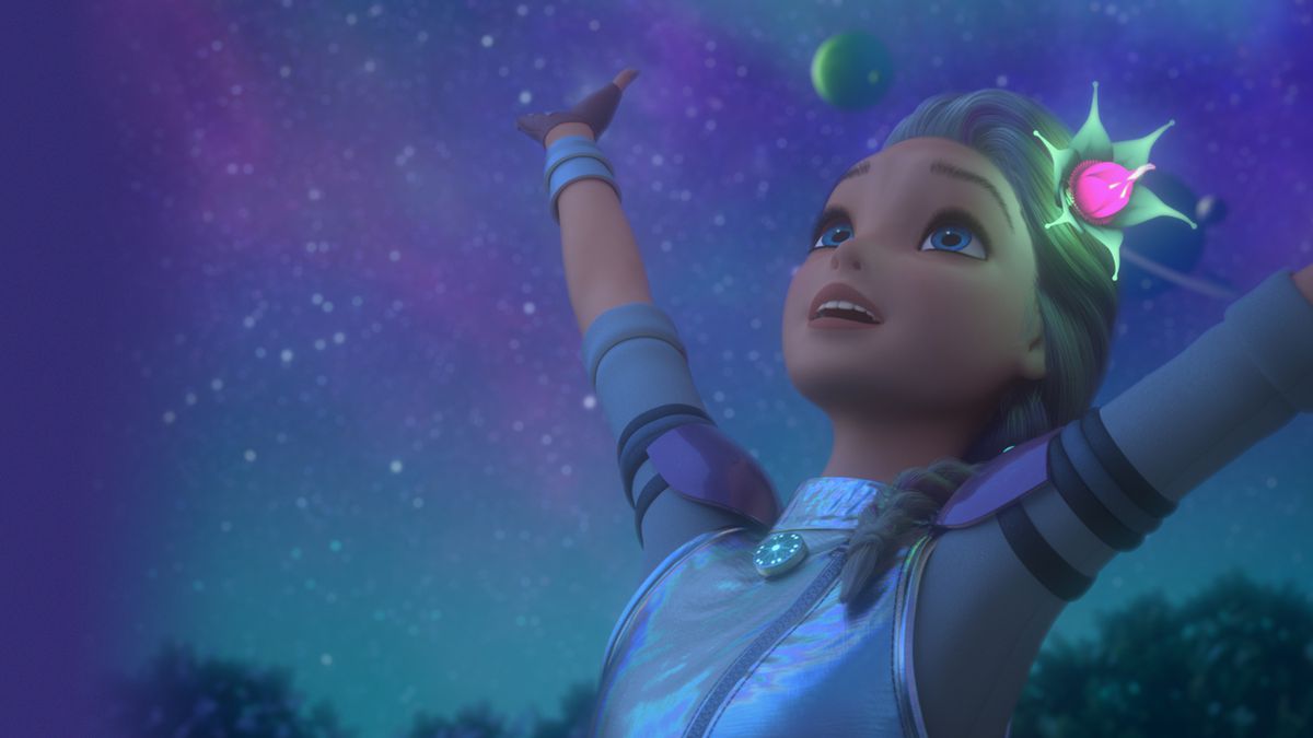 Barbie in a silver space suit, holding her hands up in the sky. Behind her is an impressive starscape.