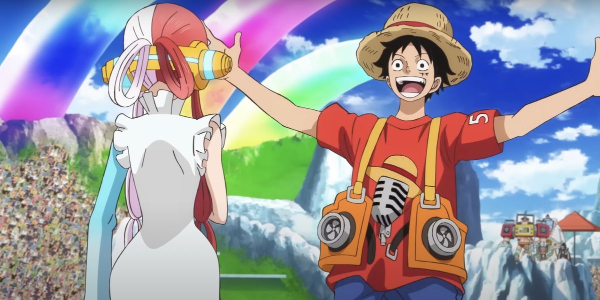 Piraten Luffy som bär halmhatt, i centrum för One Piece-anime- och mangaserien, hälsar sin gamla vän Uta med öppna armar och enormt öppen mun i One Piece Film: Red