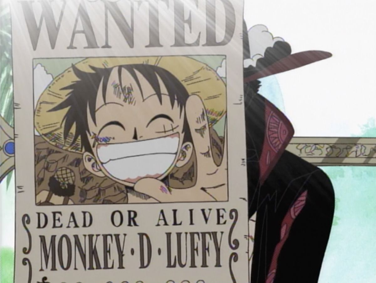 en bild av en efterlyst affisch — Luffy ler mot den